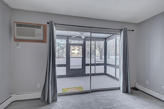 doorway to outside with a baseboard radiator, an AC wall unit, a textured ceiling, and carpet