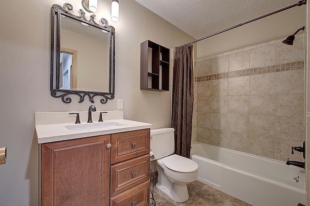 full bathroom featuring shower / tub combo with curtain, vanity, a textured ceiling, and toilet