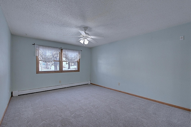 carpeted spare room featuring ceiling fan, a textured ceiling, and baseboard heating