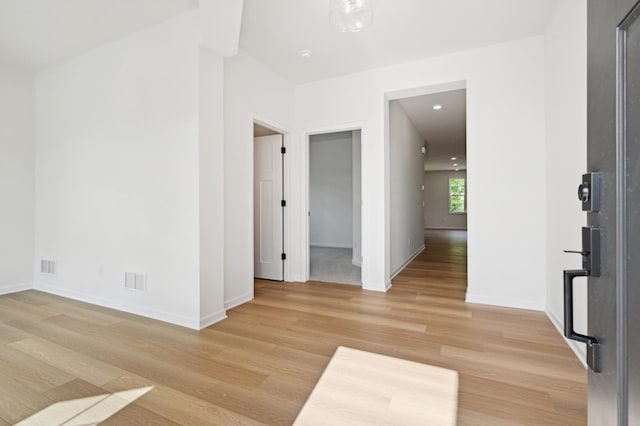 empty room with wood-type flooring