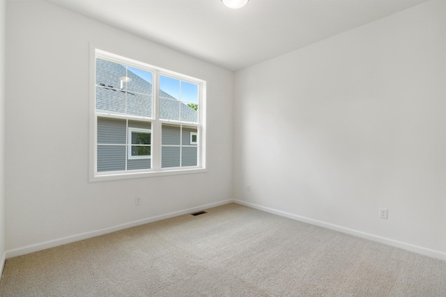 spare room with carpet flooring