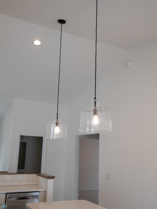 room details featuring hanging light fixtures and dishwasher