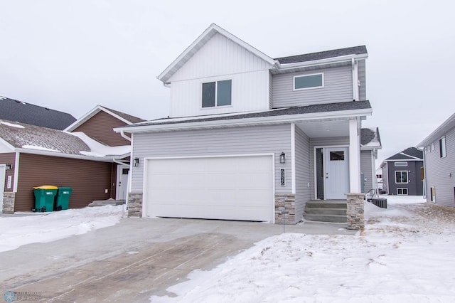 view of front of property with a garage