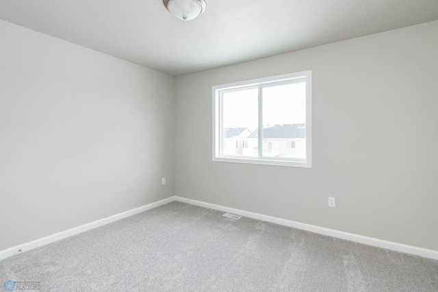 spare room with carpet flooring