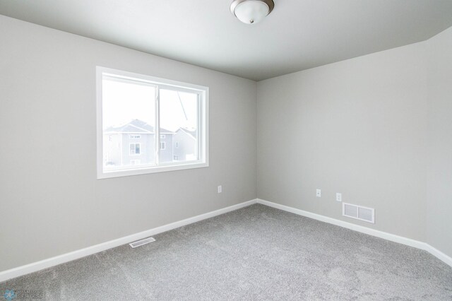 empty room featuring carpet