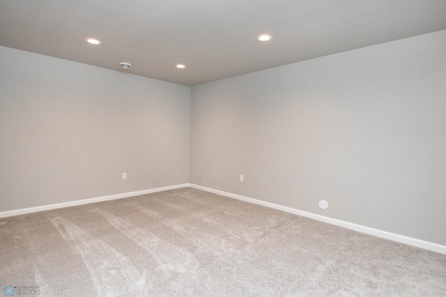 empty room featuring carpet floors