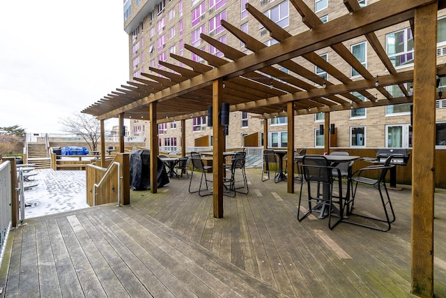 wooden deck with a pergola