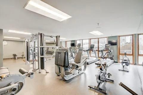 exercise room with a wall of windows