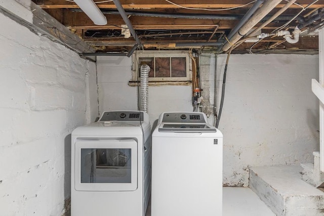 laundry room featuring laundry area and washing machine and clothes dryer