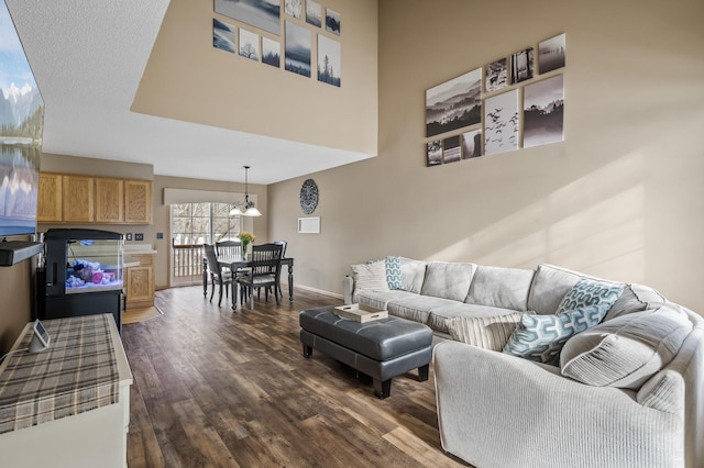 living room with dark hardwood / wood-style flooring