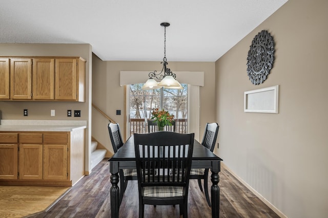 dining area with wood-type flooring