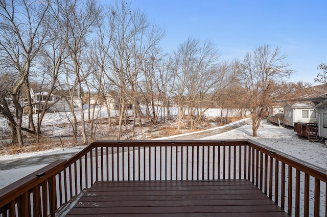 view of snow covered deck