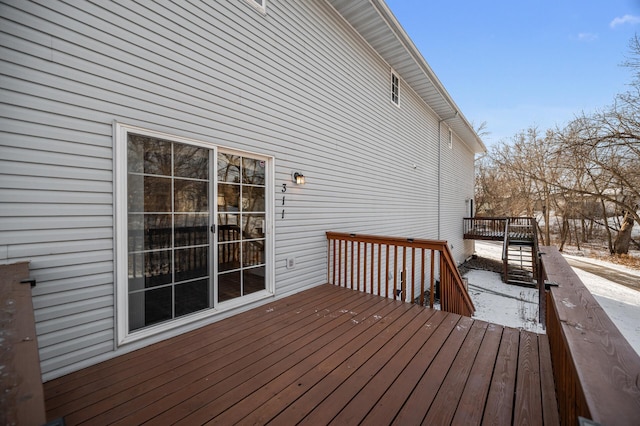 view of snow covered deck