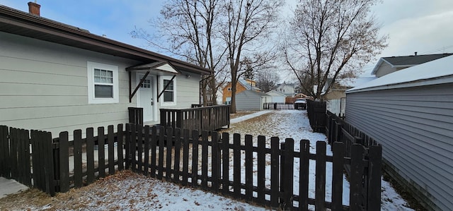 view of snow covered deck