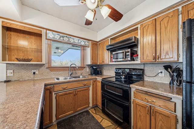 kitchen with tasteful backsplash, sink, and range with two ovens