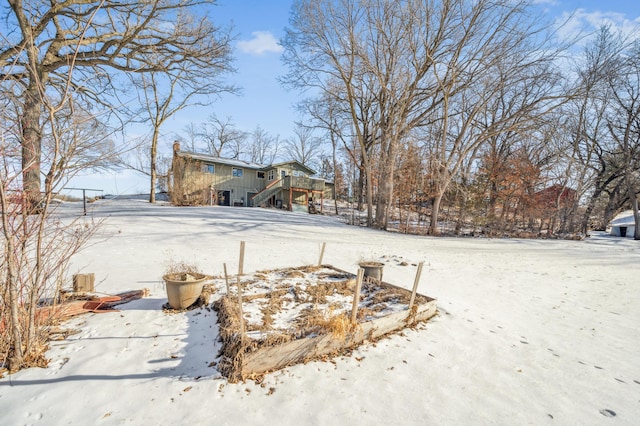 view of snowy yard