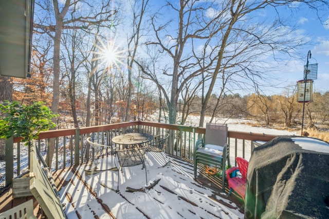 view of snow covered deck