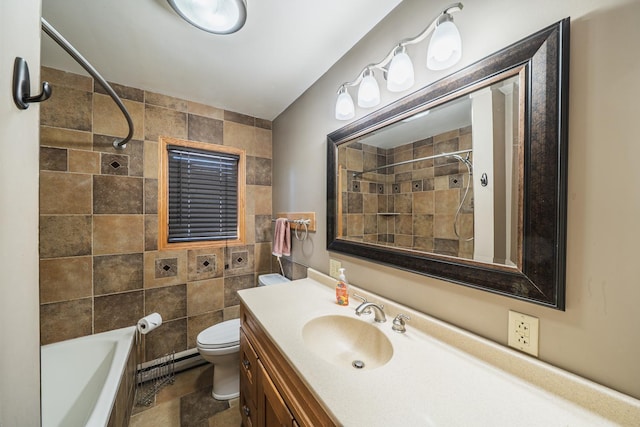 bathroom with baseboard heating, vanity, toilet, and tile walls