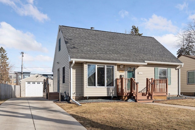 view of front of home with a garage, an outdoor structure, driveway, roof with shingles, and a front lawn