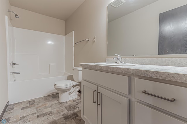 full bathroom with toilet, washtub / shower combination, and vanity