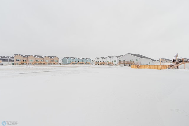 view of yard covered in snow