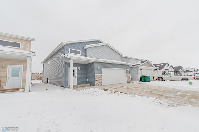 view of front of property with a garage