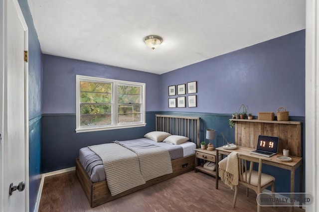 bedroom featuring wood-type flooring