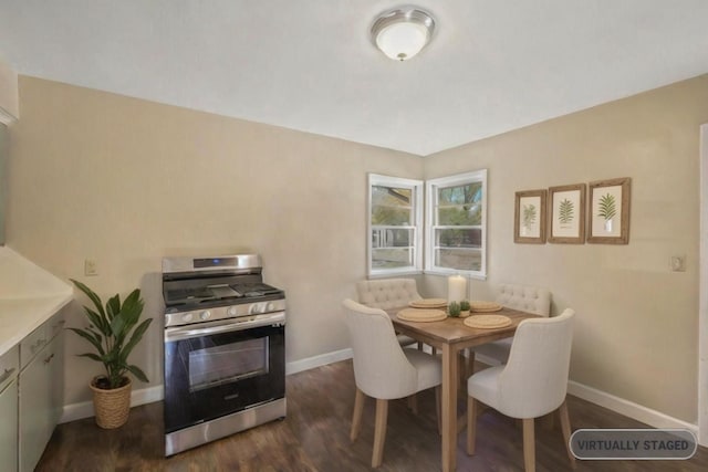 dining space with dark wood-type flooring