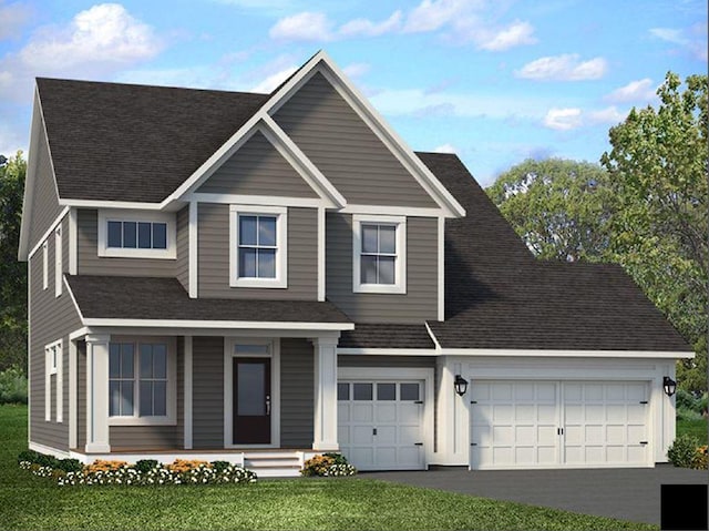 view of front of home with a garage, covered porch, and a front lawn