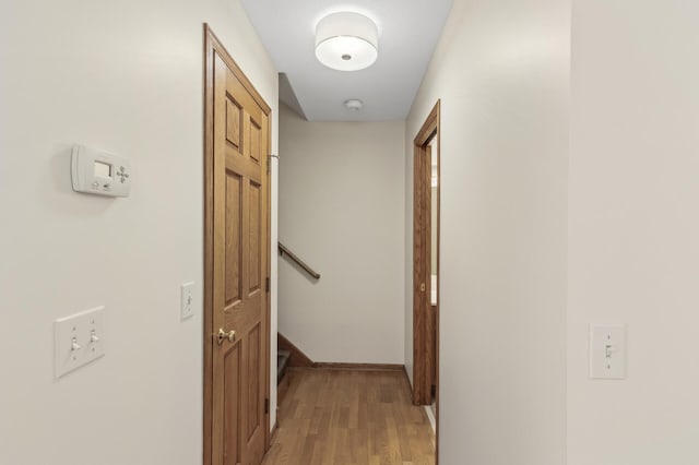 hallway featuring light hardwood / wood-style flooring