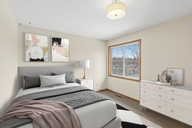 bedroom featuring light carpet