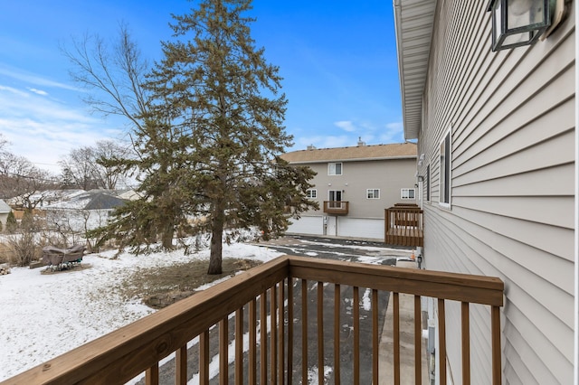 view of snow covered deck