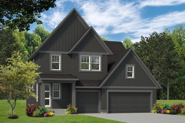 view of front of house featuring a garage and a front yard