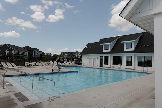 view of swimming pool featuring a patio