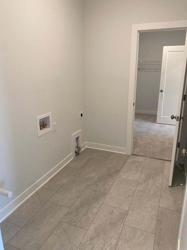 laundry area with washer hookup and hookup for an electric dryer