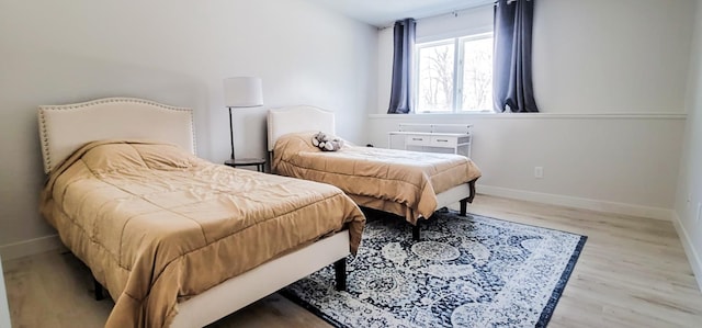 bedroom featuring light hardwood / wood-style flooring