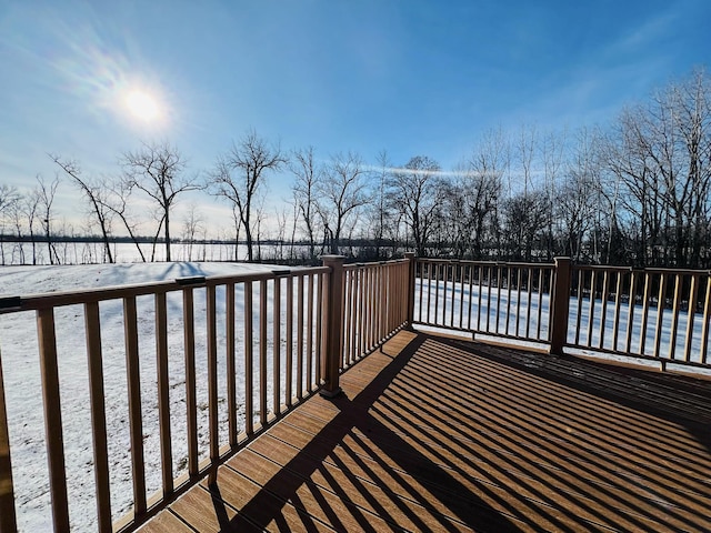 view of snow covered deck