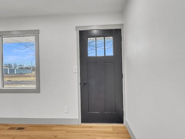 foyer featuring hardwood / wood-style flooring