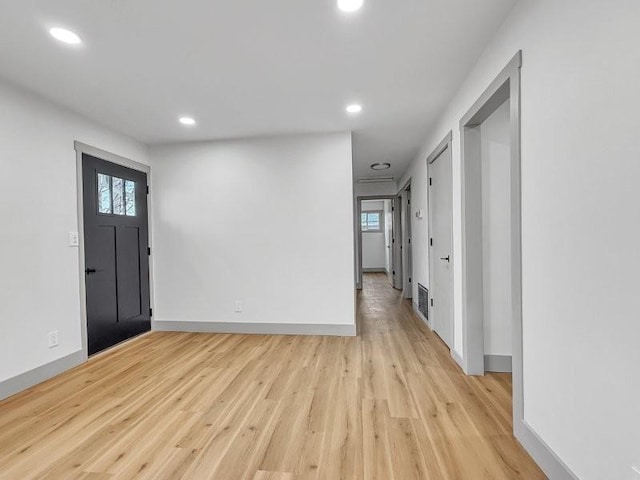 foyer entrance featuring light hardwood / wood-style flooring