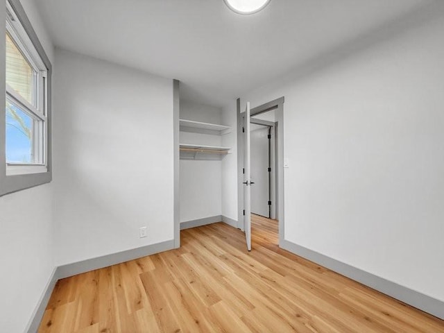 unfurnished bedroom featuring light hardwood / wood-style floors