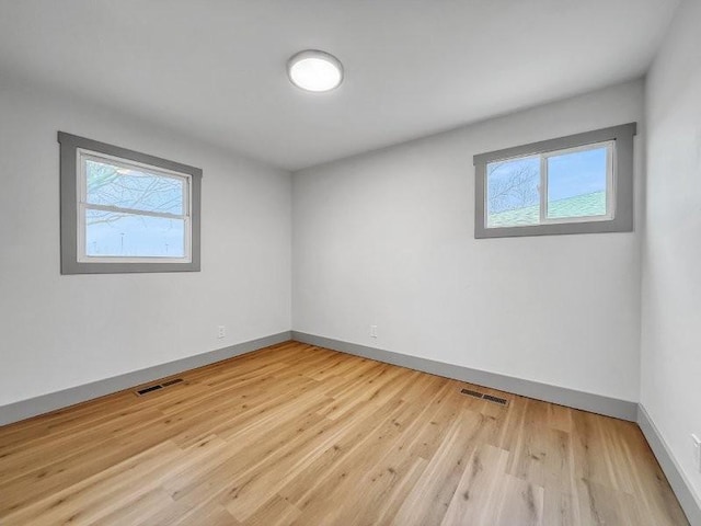 empty room featuring light hardwood / wood-style floors