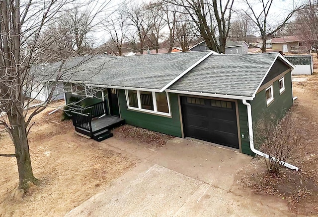 ranch-style home featuring a garage