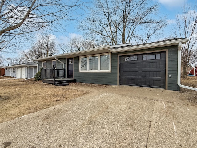 ranch-style home with a garage