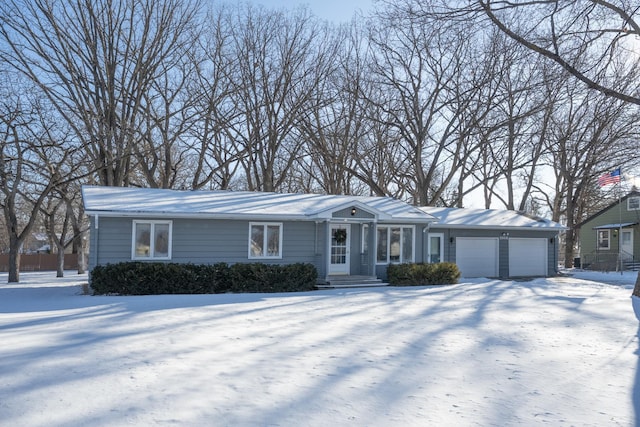 ranch-style home with a garage