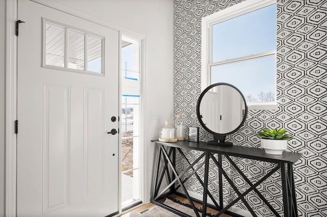 foyer featuring plenty of natural light