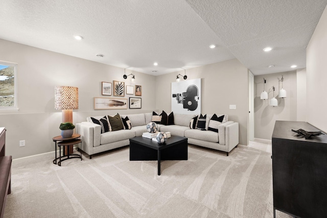 living room featuring light carpet and a textured ceiling