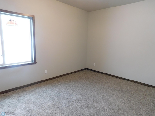 view of carpeted spare room