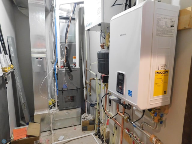 utility room with heating unit and tankless water heater