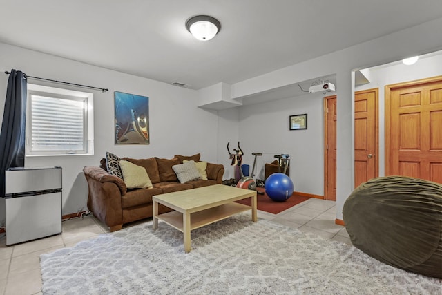 living room featuring light tile patterned flooring