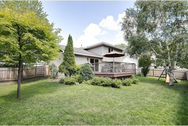 view of yard featuring a deck